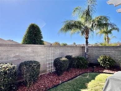 This three bedroom and two bath Anaheim courtyard villa will on Yankee Clipper Executive Golf Course in Florida - for sale on GolfHomes.com, golf home, golf lot