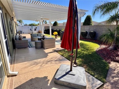 This three bedroom and two bath Anaheim courtyard villa will on Yankee Clipper Executive Golf Course in Florida - for sale on GolfHomes.com, golf home, golf lot