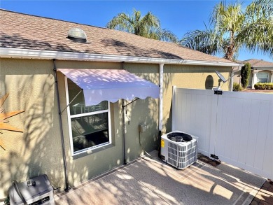 This three bedroom and two bath Anaheim courtyard villa will on Yankee Clipper Executive Golf Course in Florida - for sale on GolfHomes.com, golf home, golf lot