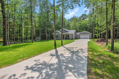 Your wooded sanctuary awaits! Escape to this stunning, newly on Canadian Lakes Country Club-The Royal Course in Michigan - for sale on GolfHomes.com, golf home, golf lot