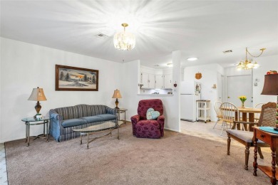 Welcome to 423 D Woodbridge, Ridge, a delightful one-bedroom on Leisure Village Golf Course in New York - for sale on GolfHomes.com, golf home, golf lot