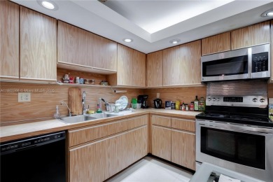 Spacious and well-maintained 2-bedroom, 2-bath condo offering on Jim McLean Signature Course in Florida - for sale on GolfHomes.com, golf home, golf lot