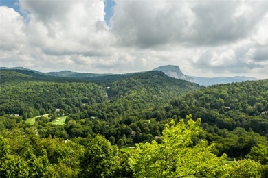 A superb, gently sloping building lot with stunning views of on Highlands Falls Country Club in North Carolina - for sale on GolfHomes.com, golf home, golf lot