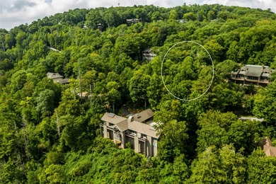 A superb, gently sloping building lot with stunning views of on Highlands Falls Country Club in North Carolina - for sale on GolfHomes.com, golf home, golf lot