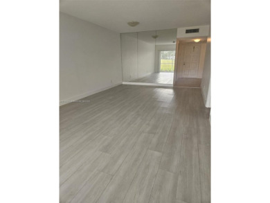 Best priced large unit in sought after Palm Aire CC! Very on Palm-Aire Country Club and Resort - Palms in Florida - for sale on GolfHomes.com, golf home, golf lot