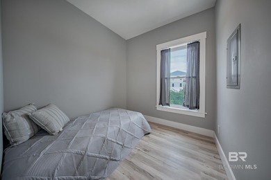 This Gold Fortified beach home, built in 2023, is just a short on Kiva Dunes Golf Club in Alabama - for sale on GolfHomes.com, golf home, golf lot