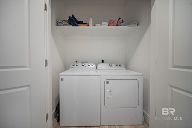 This Gold Fortified beach home, built in 2023, is just a short on Kiva Dunes Golf Club in Alabama - for sale on GolfHomes.com, golf home, golf lot