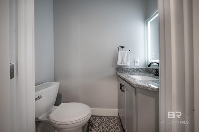 This Gold Fortified beach home, built in 2023, is just a short on Kiva Dunes Golf Club in Alabama - for sale on GolfHomes.com, golf home, golf lot