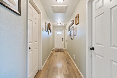 This charming 3 bedroom, 2 bath home is nestled in the highly on Silver Springs Country Club in Arkansas - for sale on GolfHomes.com, golf home, golf lot