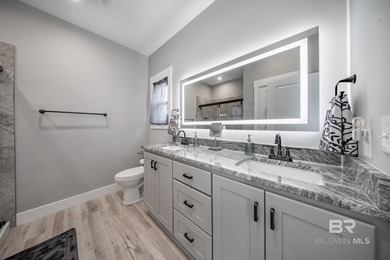 This Gold Fortified beach home, built in 2023, is just a short on Kiva Dunes Golf Club in Alabama - for sale on GolfHomes.com, golf home, golf lot