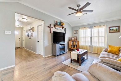 This charming 3 bedroom, 2 bath home is nestled in the highly on Silver Springs Country Club in Arkansas - for sale on GolfHomes.com, golf home, golf lot