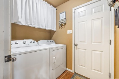 This charming 3 bedroom, 2 bath home is nestled in the highly on Silver Springs Country Club in Arkansas - for sale on GolfHomes.com, golf home, golf lot