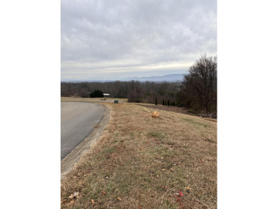 Elevate your living experience on this gently sloping, .66 acre on Dandridge Golf and Country Club in Tennessee - for sale on GolfHomes.com, golf home, golf lot