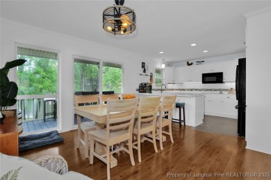 Appraised for $615k. This deceptively large lake front home has on Carolina Trace Country Club in North Carolina - for sale on GolfHomes.com, golf home, golf lot