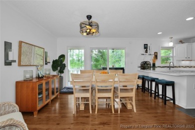 Appraised for $615k. This deceptively large lake front home has on Carolina Trace Country Club in North Carolina - for sale on GolfHomes.com, golf home, golf lot