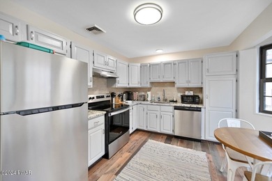 Gorgeous, updated, TURN KEY ranch style home located in Pocono on Pocono Farms Country Club in Pennsylvania - for sale on GolfHomes.com, golf home, golf lot