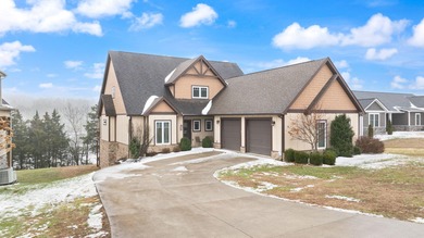 Luxury custom built lake lodge nestled alongside the shore of on Woodson Bend Resort in Kentucky - for sale on GolfHomes.com, golf home, golf lot