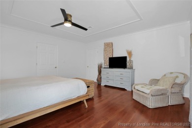 Appraised for $615k. This deceptively large lake front home has on Carolina Trace Country Club in North Carolina - for sale on GolfHomes.com, golf home, golf lot