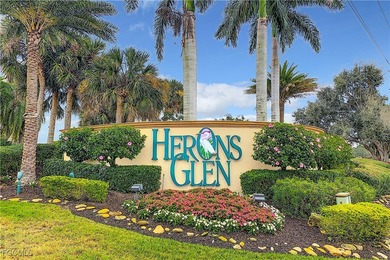This beautifully maintained LAKEFRONT Sandpiper model home in on Herons Glen Golf and Country Club in Florida - for sale on GolfHomes.com, golf home, golf lot
