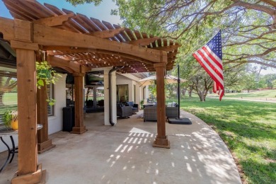 Immerse yourself in refined elegance at 4712 96th Street. This on LakeRidge Country Club in Texas - for sale on GolfHomes.com, golf home, golf lot