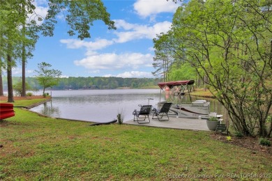 Appraised for $615k. This deceptively large lake front home has on Carolina Trace Country Club in North Carolina - for sale on GolfHomes.com, golf home, golf lot