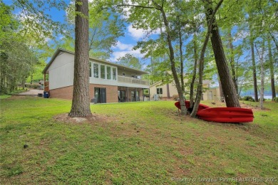 Appraised for $615k. This deceptively large lake front home has on Carolina Trace Country Club in North Carolina - for sale on GolfHomes.com, golf home, golf lot