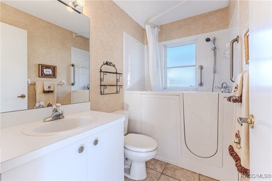 Discover the charm and tranquility in this beautiful 2-bedroom on Timber Pines Golf Course in Florida - for sale on GolfHomes.com, golf home, golf lot