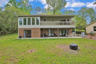 Appraised for $615k. This deceptively large lake front home has on Carolina Trace Country Club in North Carolina - for sale on GolfHomes.com, golf home, golf lot