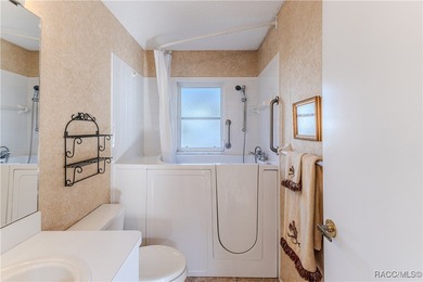 Discover the charm and tranquility in this beautiful 2-bedroom on Timber Pines Golf Course in Florida - for sale on GolfHomes.com, golf home, golf lot