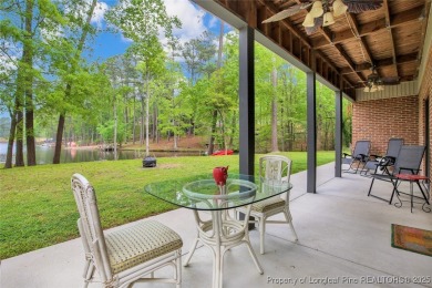 Appraised for $615k. This deceptively large lake front home has on Carolina Trace Country Club in North Carolina - for sale on GolfHomes.com, golf home, golf lot