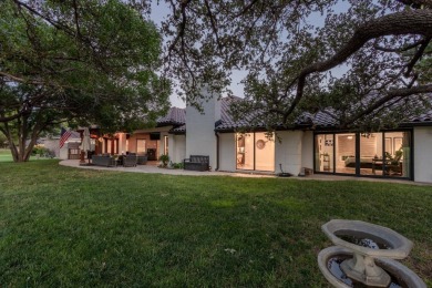 Immerse yourself in refined elegance at 4712 96th Street. This on LakeRidge Country Club in Texas - for sale on GolfHomes.com, golf home, golf lot