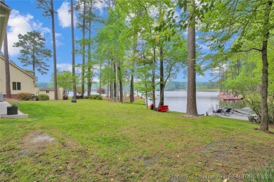 Appraised for $615k. This deceptively large lake front home has on Carolina Trace Country Club in North Carolina - for sale on GolfHomes.com, golf home, golf lot