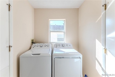 Discover the charm and tranquility in this beautiful 2-bedroom on Timber Pines Golf Course in Florida - for sale on GolfHomes.com, golf home, golf lot