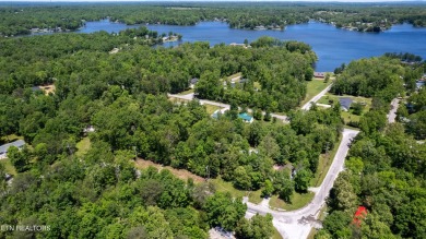 Nestled in the serene Quapaw Subdivision of beautiful Lake Tansi on Lake Tansi Village Country Club in Tennessee - for sale on GolfHomes.com, golf home, golf lot