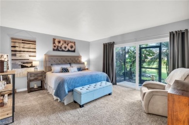 Discover this beautiful move-in-ready first-floor end unit in on The Glades Golf and Country Club in Florida - for sale on GolfHomes.com, golf home, golf lot