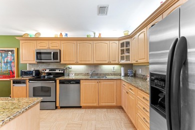 This spacious, sun-filled 2nd-floor condo showcases breathtaking on Hunters Run Golf and Country Club in Florida - for sale on GolfHomes.com, golf home, golf lot