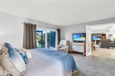 Discover this beautiful move-in-ready first-floor end unit in on The Glades Golf and Country Club in Florida - for sale on GolfHomes.com, golf home, golf lot