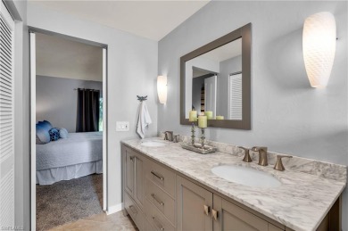 Discover this beautiful move-in-ready first-floor end unit in on The Glades Golf and Country Club in Florida - for sale on GolfHomes.com, golf home, golf lot