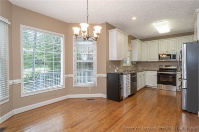 This gorgeous 2 story home on the golf course in Kings Grants on Kings Grant Golf and Country Club in North Carolina - for sale on GolfHomes.com, golf home, golf lot