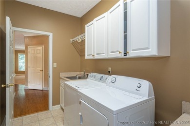 This gorgeous 2 story home on the golf course in Kings Grants on Kings Grant Golf and Country Club in North Carolina - for sale on GolfHomes.com, golf home, golf lot