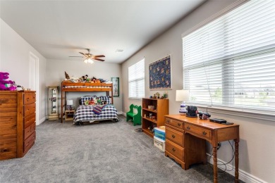 Discover the rare opportunity to own a two-story Ashland model on Wildhorse Golf Club of Robson Ranch in Texas - for sale on GolfHomes.com, golf home, golf lot
