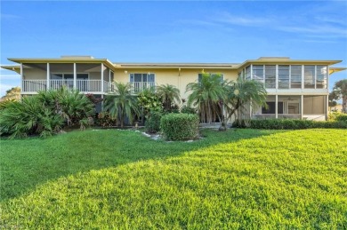 Discover this beautiful move-in-ready first-floor end unit in on The Glades Golf and Country Club in Florida - for sale on GolfHomes.com, golf home, golf lot