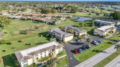 Discover this beautiful move-in-ready first-floor end unit in on The Glades Golf and Country Club in Florida - for sale on GolfHomes.com, golf home, golf lot