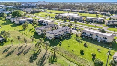 Discover this beautiful move-in-ready first-floor end unit in on The Glades Golf and Country Club in Florida - for sale on GolfHomes.com, golf home, golf lot