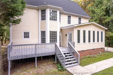 This gorgeous 2 story home on the golf course in Kings Grants on Kings Grant Golf and Country Club in North Carolina - for sale on GolfHomes.com, golf home, golf lot