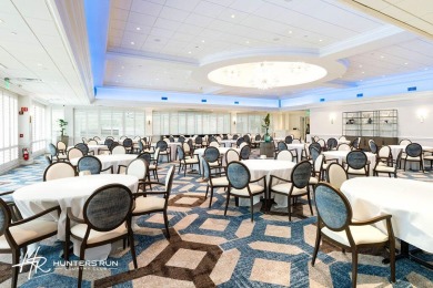 This spacious, sun-filled 2nd-floor condo showcases breathtaking on Hunters Run Golf and Country Club in Florida - for sale on GolfHomes.com, golf home, golf lot