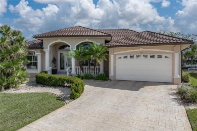 CUSTOM WATERFRONT HOME IN BSI ON KEY LOT W/**NEW METAL TILE on Twin Isles Country Club in Florida - for sale on GolfHomes.com, golf home, golf lot