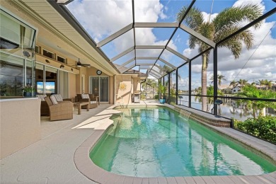 CUSTOM WATERFRONT HOME IN BSI ON KEY LOT W/**NEW METAL TILE on Twin Isles Country Club in Florida - for sale on GolfHomes.com, golf home, golf lot