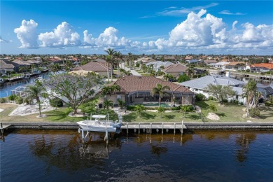 CUSTOM WATERFRONT HOME IN BSI ON KEY LOT W/**NEW METAL TILE on Twin Isles Country Club in Florida - for sale on GolfHomes.com, golf home, golf lot