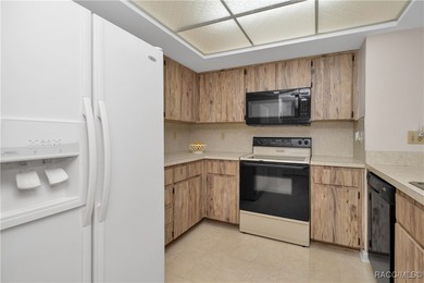 Spacious 2 bedroom 2 bath *end unit* condo with a `Spectacular` on Sugarmill Woods Golf and Country Club in Florida - for sale on GolfHomes.com, golf home, golf lot